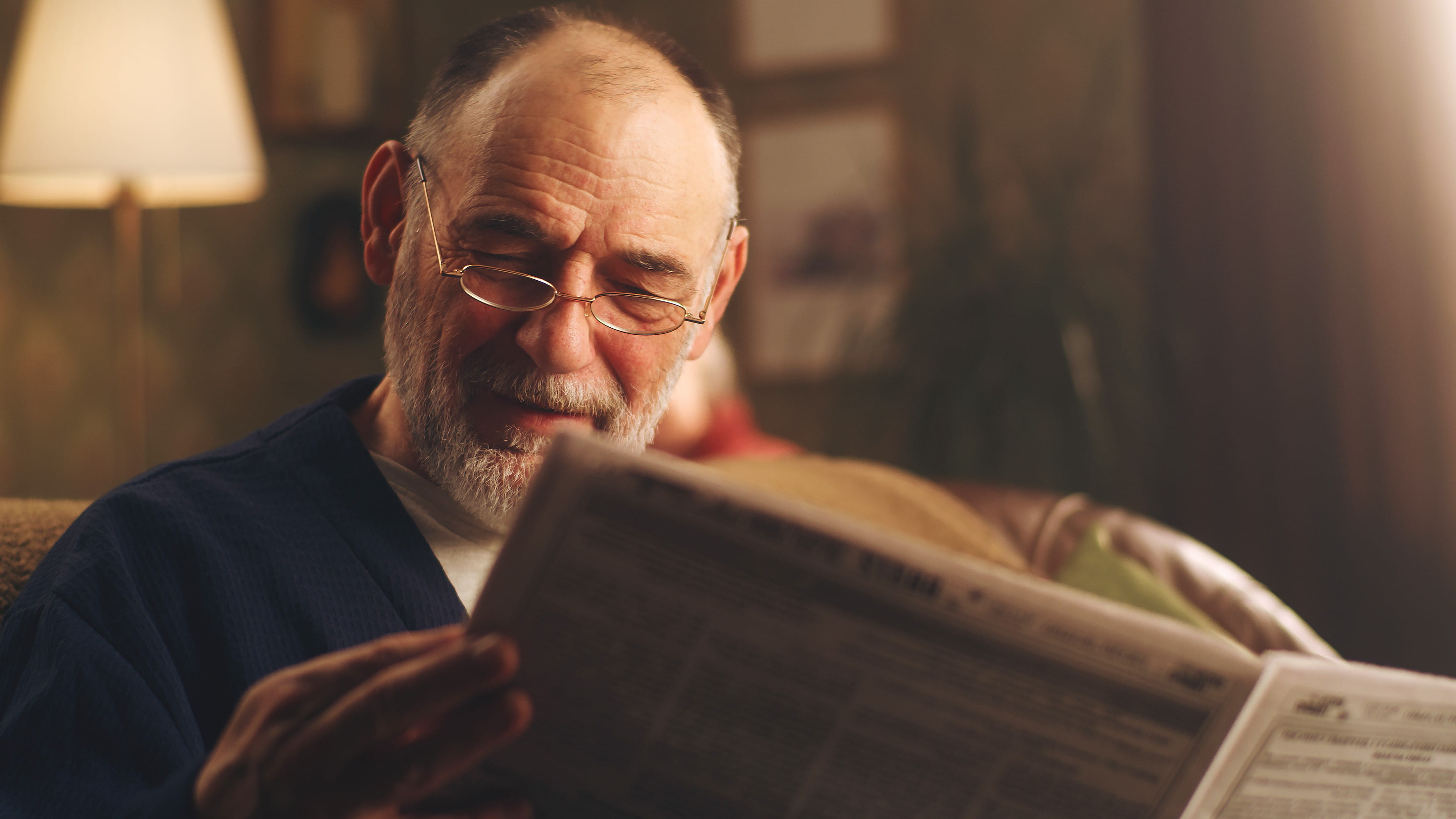 Man reading newspaper
